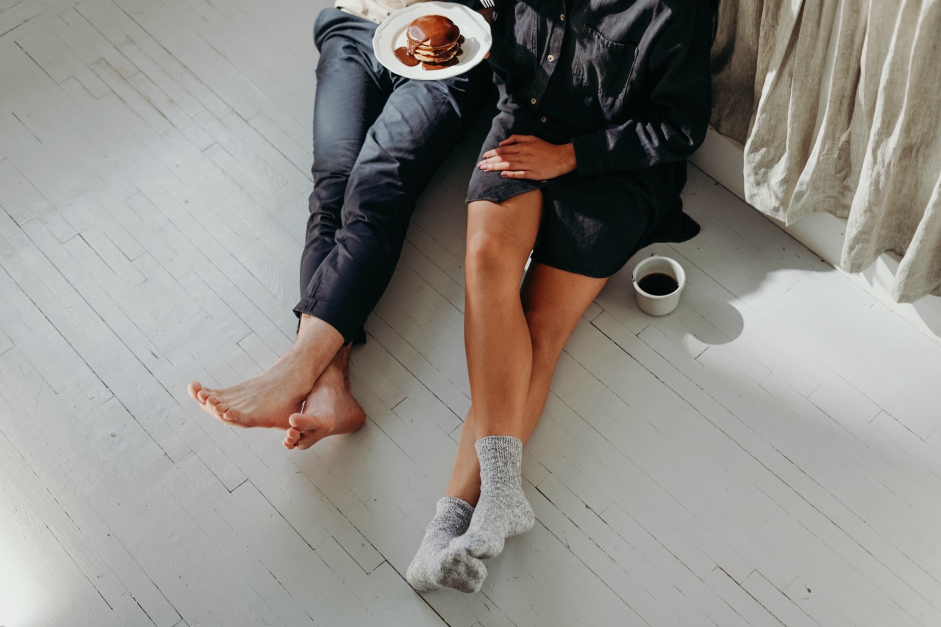 Couple Talking Over a Meal How to Divvy Up Responsibilities In Marriage